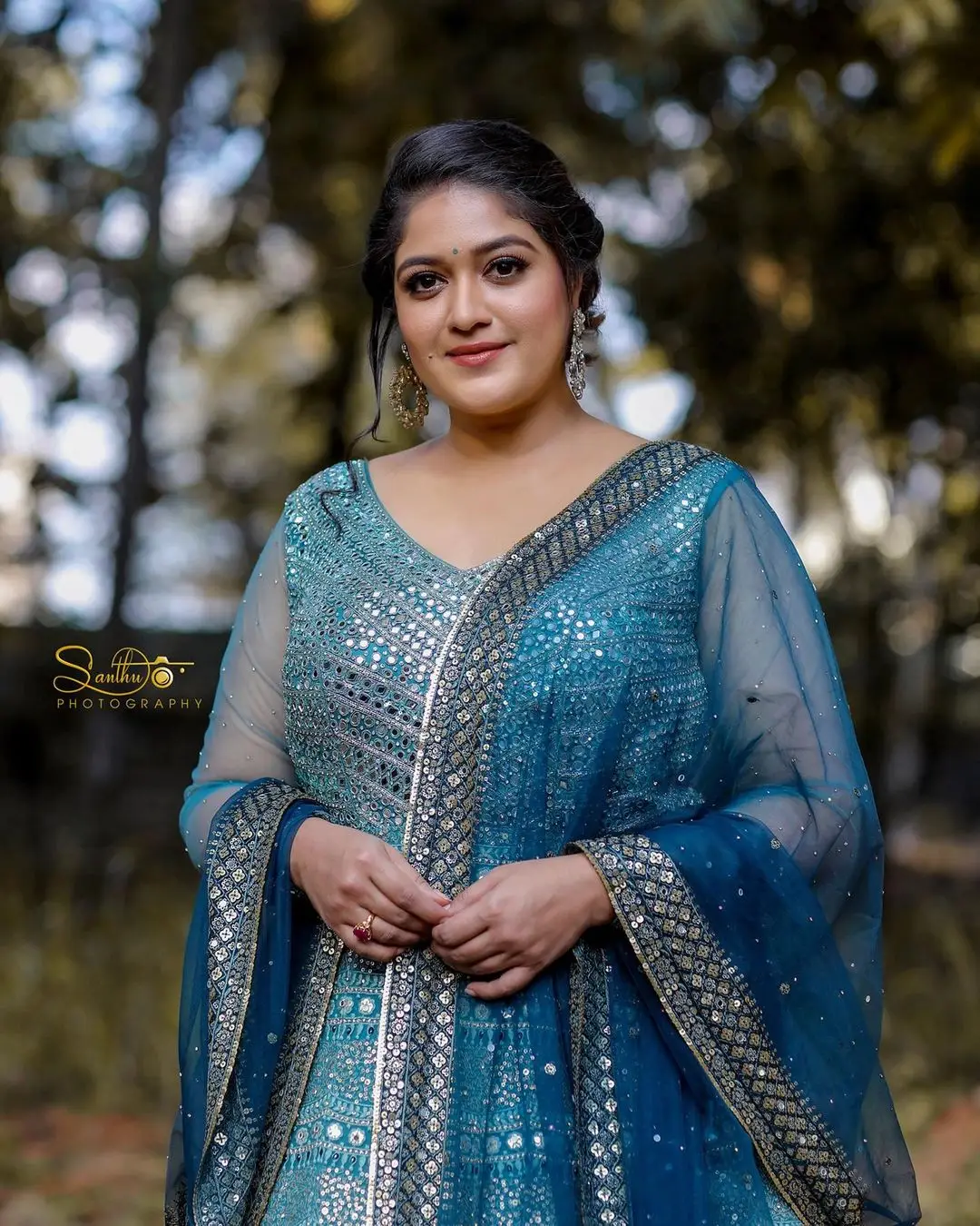 Actress Meghana Raj Stills in Beautiful Blue Designer Gown